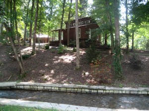 Cosy, rustic cabin on 6.15 ac with a rushing creek along the front of the property