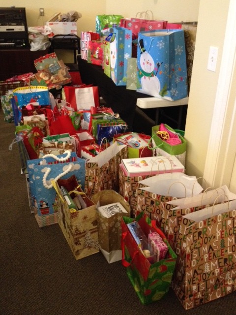 CASA presents gathered at the Brentwood office holiday party