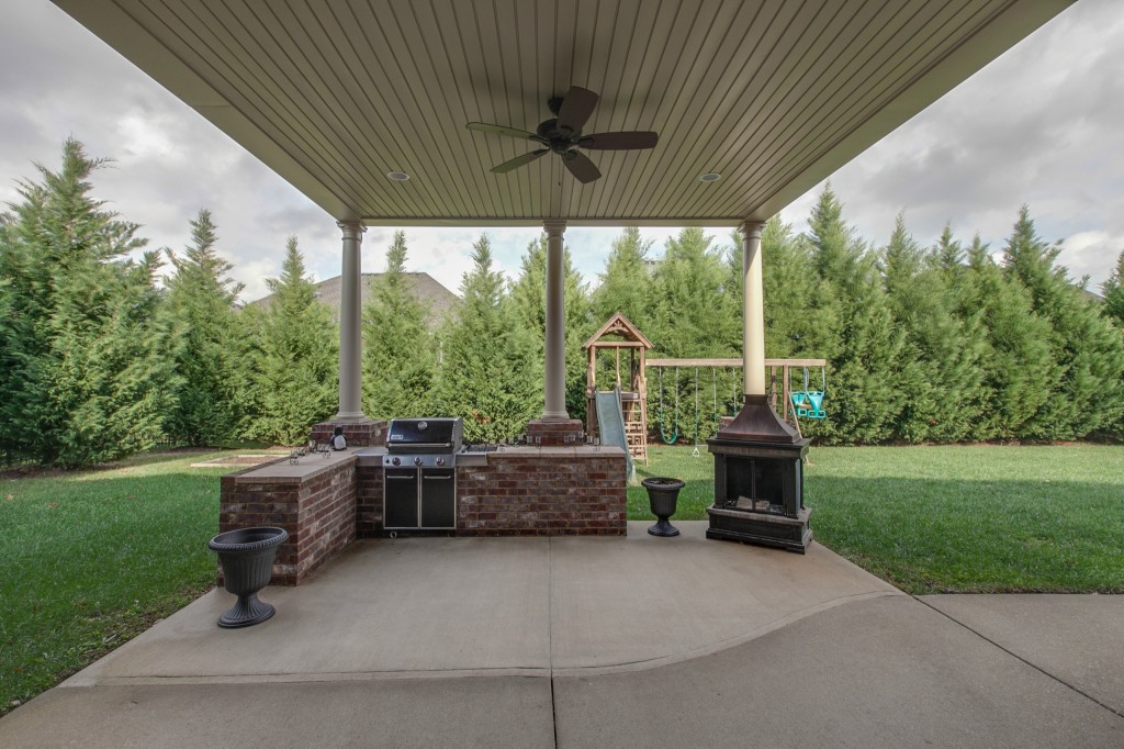 This house also features an inviting covered patio with landscaped privacy that opens into a large, welcoming backyard.