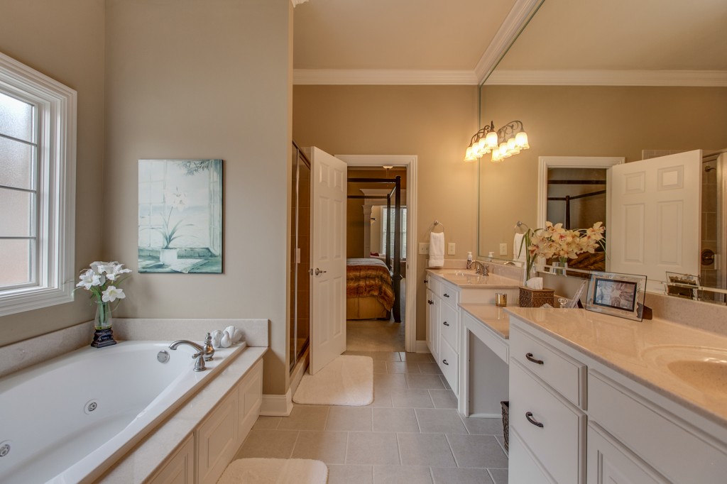 The beautiful and large master bathroom and features a soaking tub and double vanities.