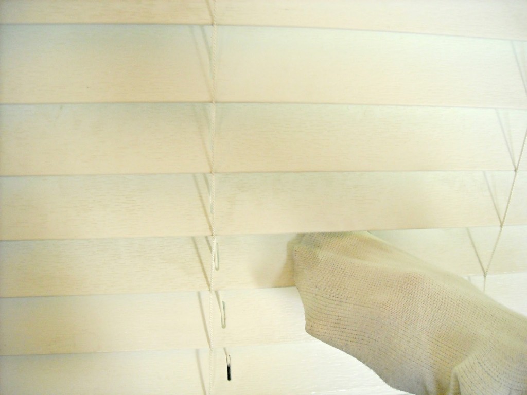 Easily clean your blinds using a water and vinegar mixture!