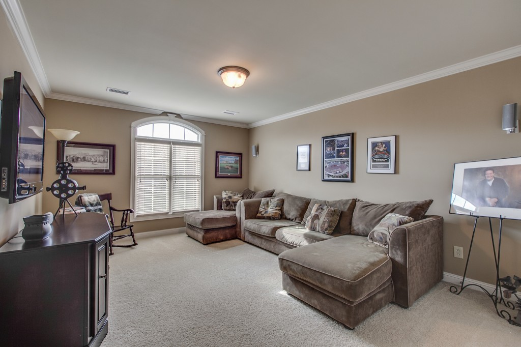 Sitting in this cozy den is a great way to relax at the end of the day.
