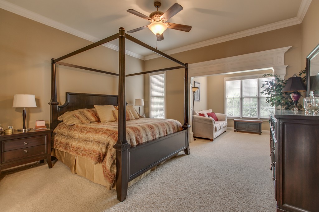 The extra-large master bedroom has an attached sitting room.