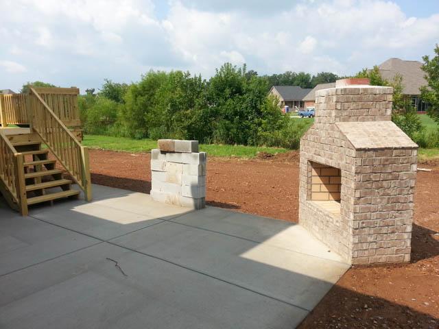 Additionally, the backyard has a large patio and outdoor fireplace