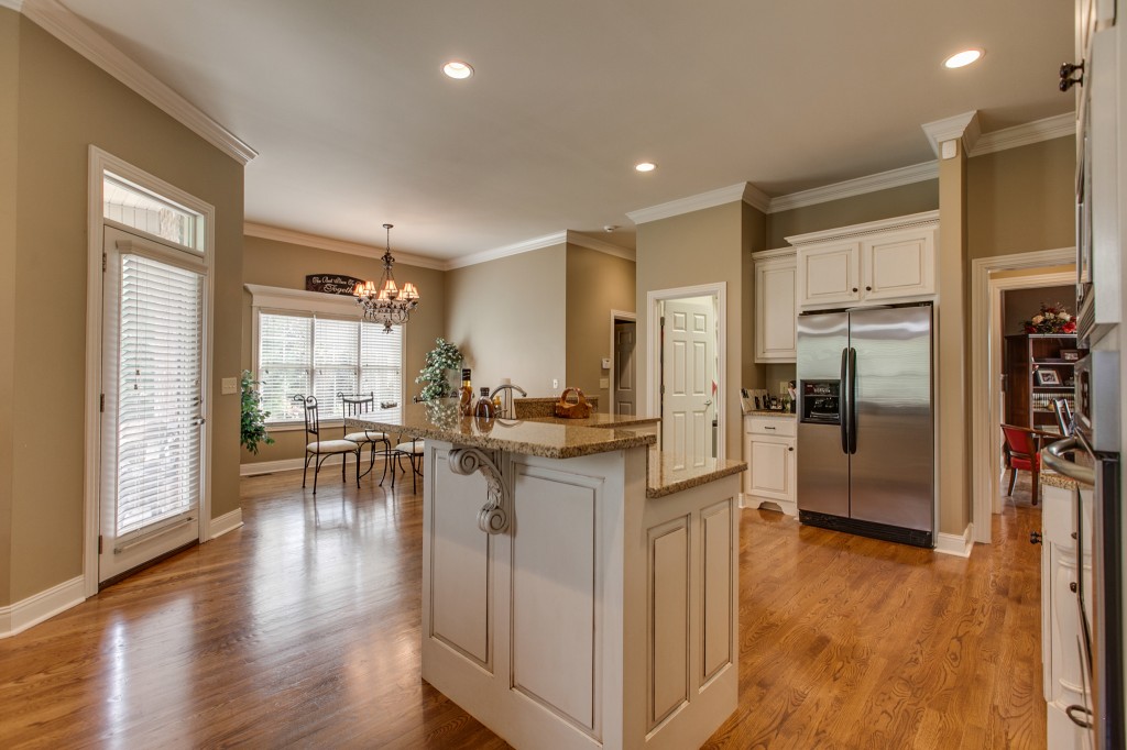 The roomy kitchen has a breakfast nook and walk-in pantry.