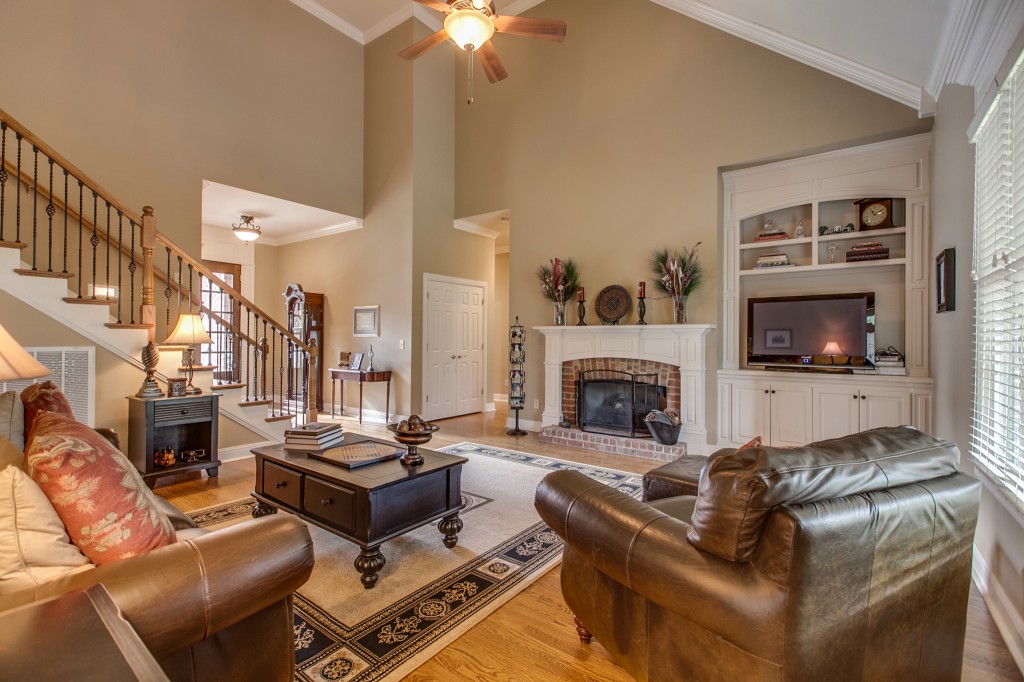 A specious living room with a vaulted ceiling greets you as you walk in the front door.